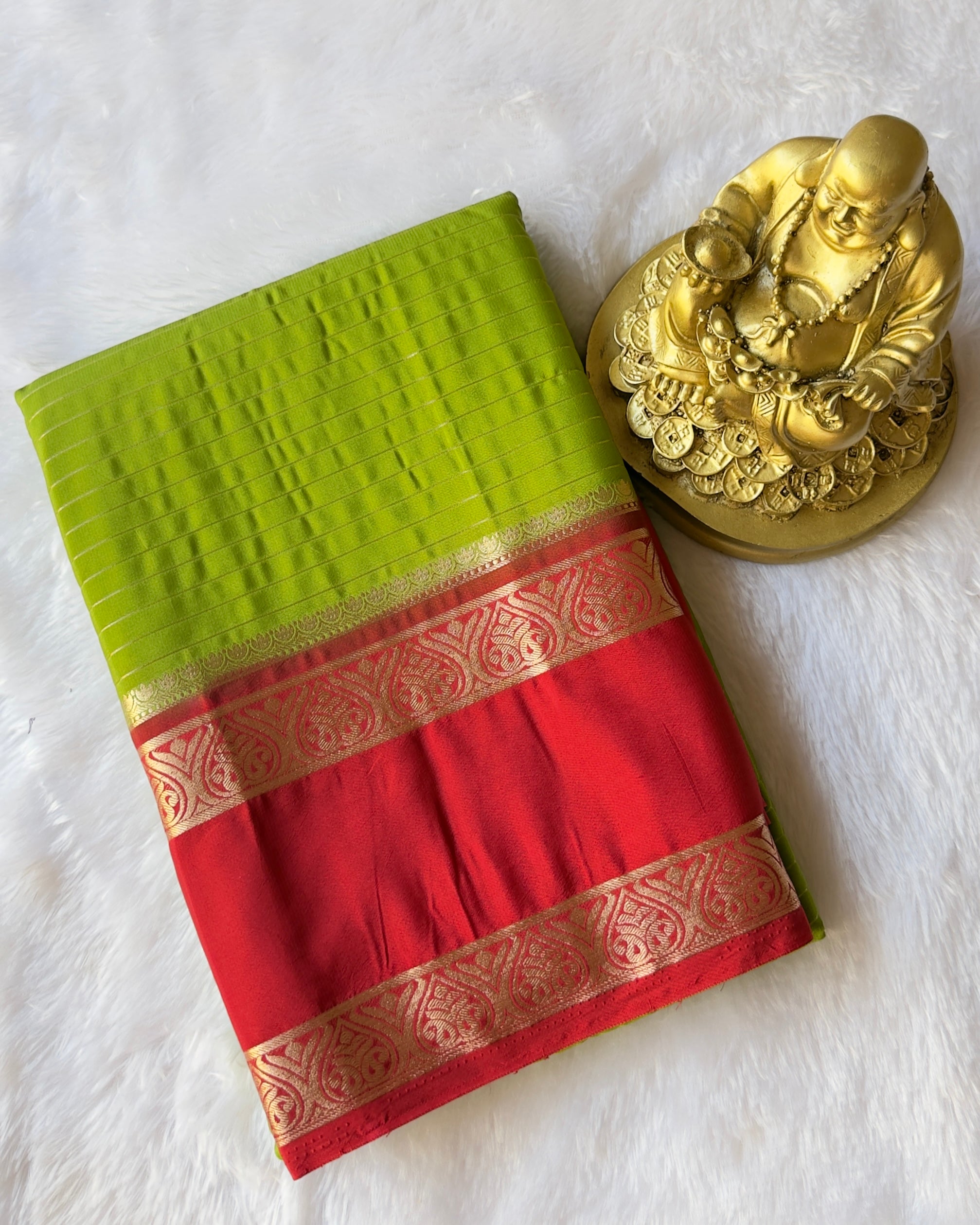 Semi Mysore Silk Striped Body with Traditional Paisley mango Border