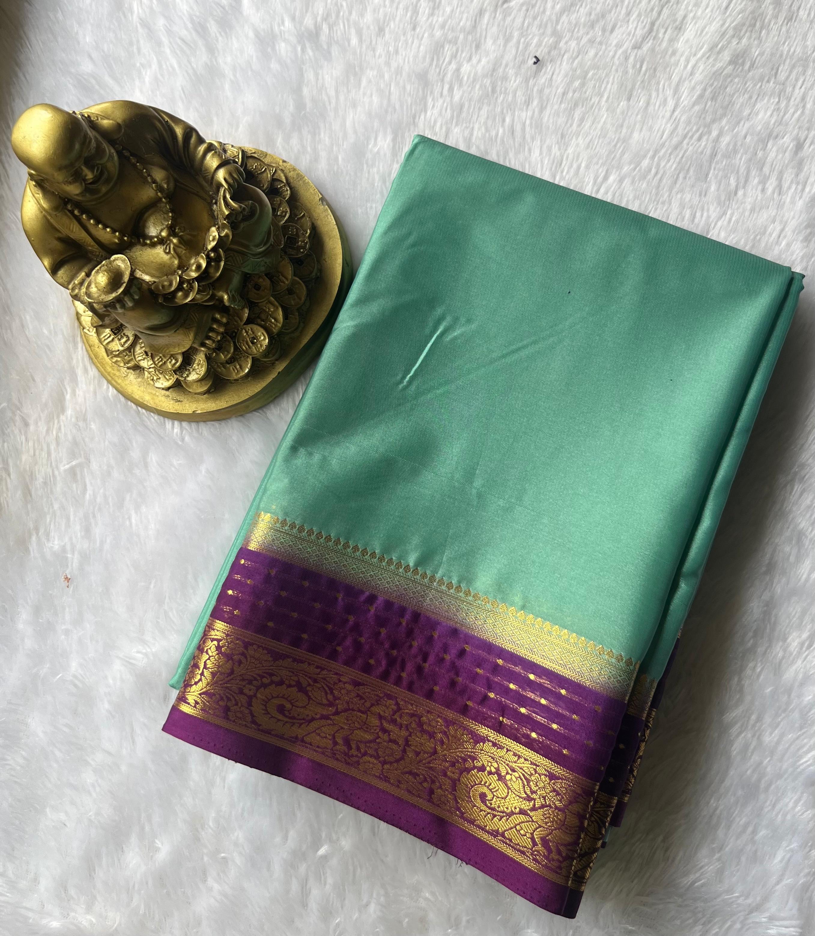 Semi Mysore Silk Plain With Small Pecock Border